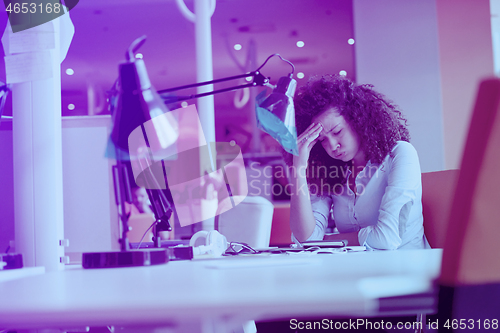 Image of young  business woman at office