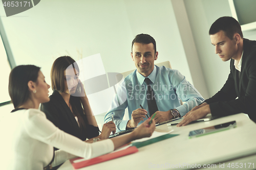 Image of business people in a meeting at office