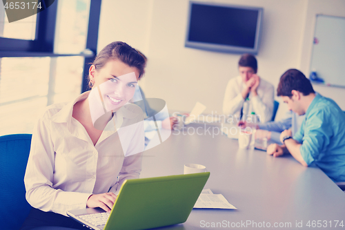 Image of business people in a meeting at office