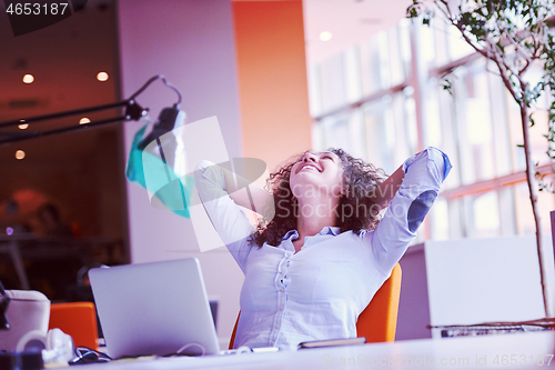 Image of young  business woman at office