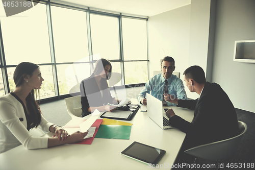 Image of business people group in a meeting at office