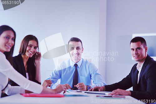 Image of business people in a meeting at office