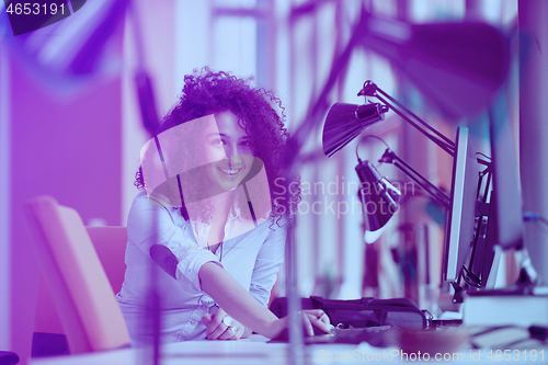 Image of young  business woman at office