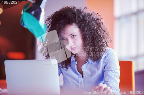 Image of young  business woman at office