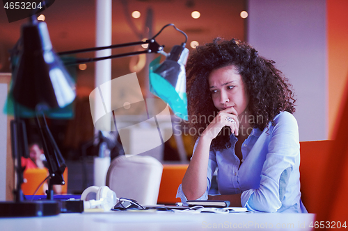 Image of young  business woman at office