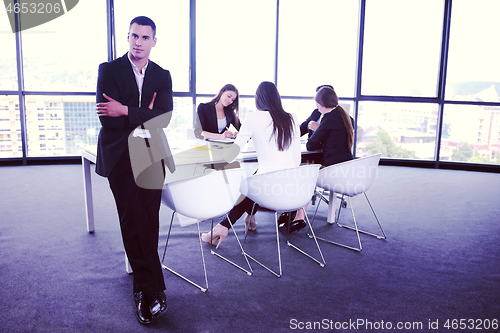 Image of business people group in a meeting at office