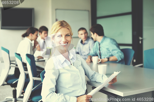 Image of business people in a meeting at office