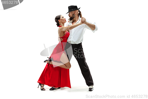 Image of Portrait of young elegance tango dancers. Isolated over white background