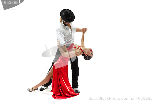 Image of Portrait of young elegance tango dancers. Isolated over white background