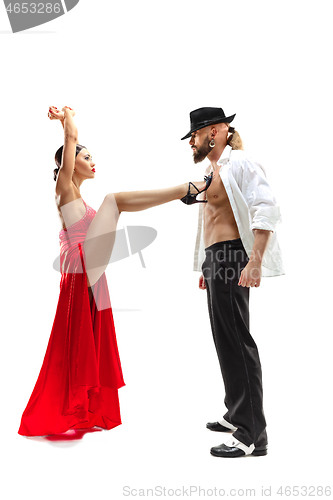 Image of Portrait of young elegance tango dancers. Isolated over white background