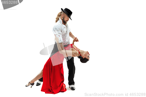 Image of Portrait of young elegance tango dancers. Isolated over white background