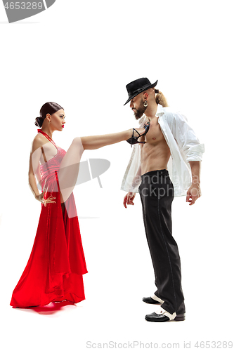 Image of Portrait of young elegance tango dancers. Isolated over white background