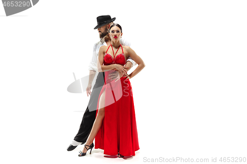 Image of Portrait of young elegance tango dancers. Isolated over white background