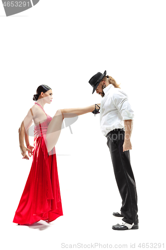 Image of Portrait of young elegance tango dancers. Isolated over white background