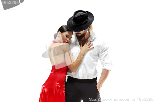 Image of Portrait of young elegance tango dancers. Isolated over white background