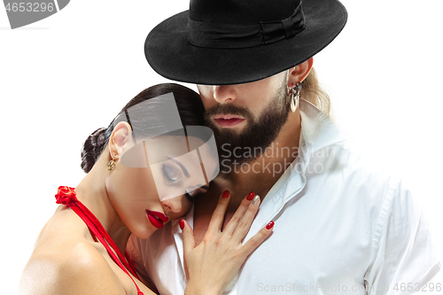 Image of Shot of a passionate young people in love. Isolated over white.