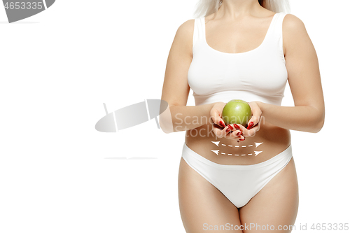 Image of Female body with the drawing arrows. Fat lose, liposuction and cellulite removal concept