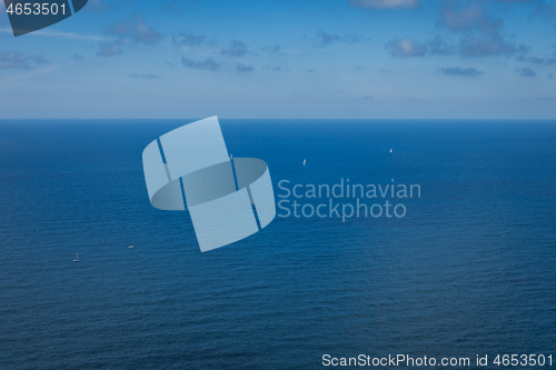 Image of Yachts on the Atlantic ocean, deep blue water and sky