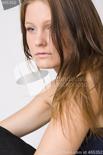 Image of young beautiful sad woman