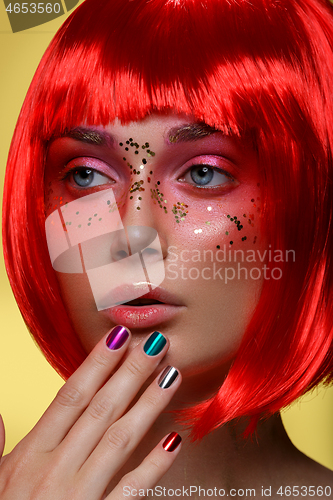 Image of Beautiful girl in red wig