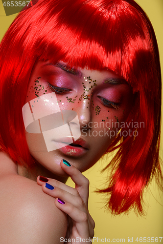 Image of Beautiful girl in red wig