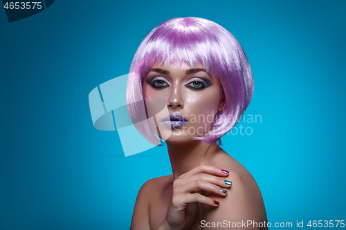 Image of Beautiful girl in purple wig