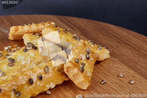 Image of baked sticks with cannabis seeds, salt