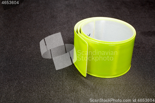 Image of bright reflective tape on dark background