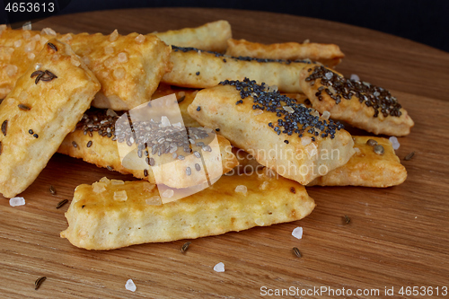 Image of baked sticks with caraway, poppy, chia seeds, salt