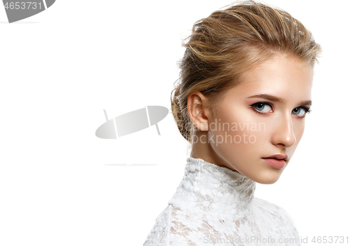 Image of beautiful dark blonde girl with natural makeup isolated on white