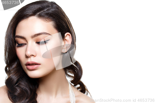 Image of beautiful brunette girl with natural makeup isolated on white