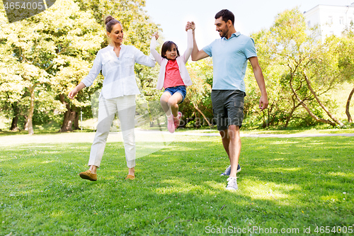 Image of happy family walking in summer park