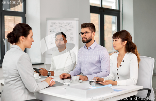 Image of recruiters having job interview with employee