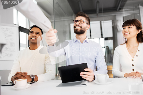 Image of recruiters having interview with employee