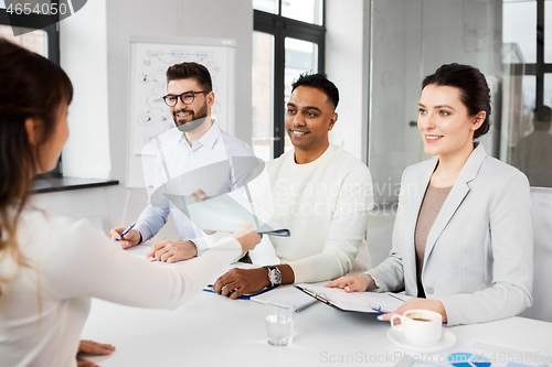 Image of recruiters having job interview with employee