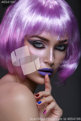 Image of Beautiful girl in purple wig
