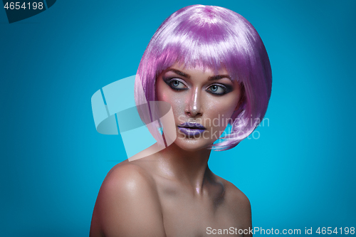 Image of Beautiful girl in purple wig