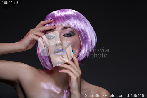 Image of Beautiful girl in purple wig