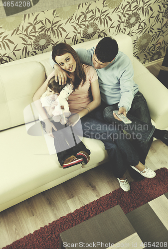 Image of happy young family at home