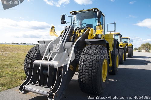 Image of Yellow Dumper