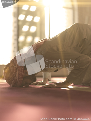 Image of muslim prayer inside the mosque