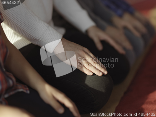 Image of muslim people praying in mosque