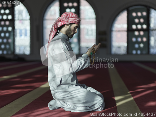 Image of muslim prayer inside the mosque