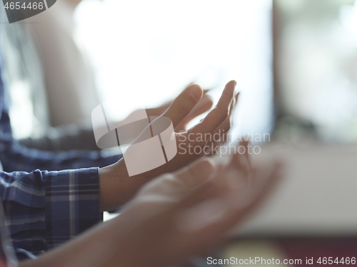 Image of muslim people praying in mosque closeup on hands