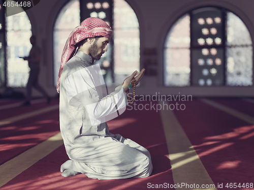 Image of muslim prayer inside the mosque