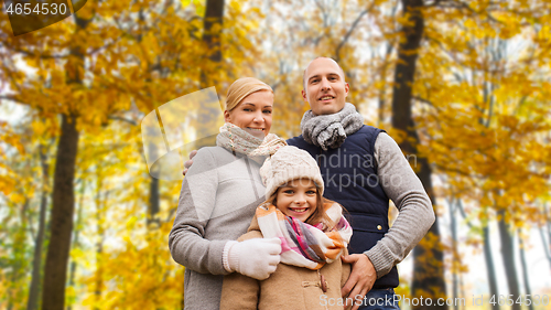 Image of happy family in autumn park