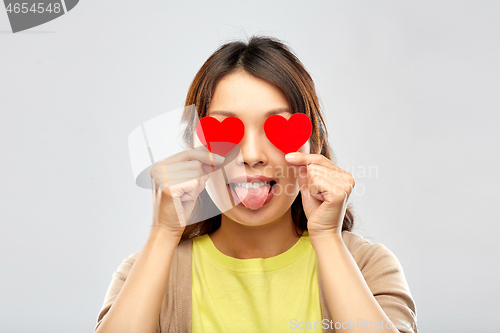 Image of happy woman with eyes of hearts