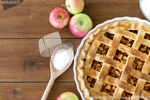 Image of close up of apple pie on wooden table