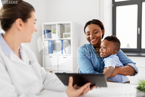 Image of mother with baby and doctor with tablet at clinic
