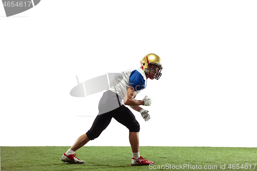 Image of American football player in action isolated on white studio background